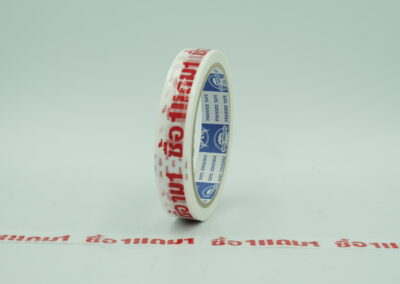เทปกาวซื้อ1แถม1 พื้นสีขาวตัวหนังสือสีแดง