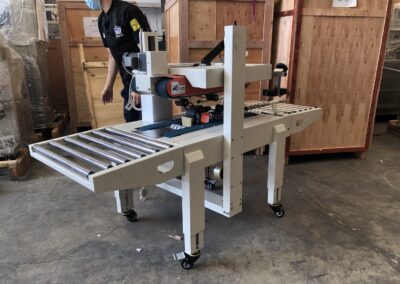 เครื่องปิดกล่อง,เครื่องปิดกล่องเทปกาว